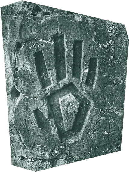 Mano tallada en piedra, el símbolo de ORIGEN